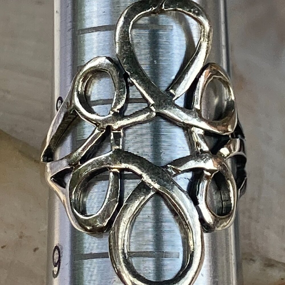 Shube sterling silver curlicue long ring